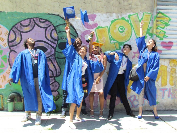 IYO students celebrate their high school graduation.
