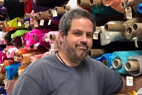 Michael Janoff, manager and owner of the Halsey Fabric Shop.